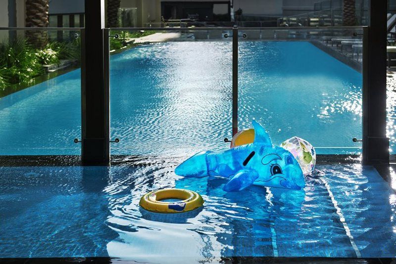 Damac Maison The Vogue Dubái Exterior foto The swimming pool at the Ritz-Carlton, Singapore